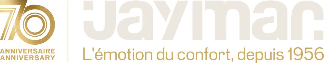 Le logo des 70 ans de Jaymar : le 70 doré, le mot Jaymar et la devise « L'émotion du confort, depuis 1956 »
